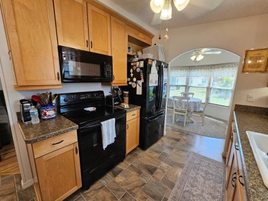 This lovely home is located in North Fort Myers Florida! Pine on Pine Lakes Country Club in Florida - for sale on GolfHomes.com, golf home, golf lot