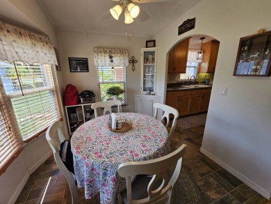 This lovely home is located in North Fort Myers Florida! Pine on Pine Lakes Country Club in Florida - for sale on GolfHomes.com, golf home, golf lot