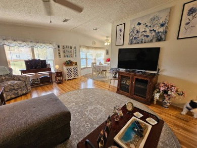 This lovely home is located in North Fort Myers Florida! Pine on Pine Lakes Country Club in Florida - for sale on GolfHomes.com, golf home, golf lot