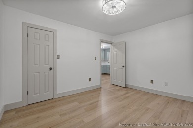 Don't miss this chance to own a charming and fully updated on The National Golf Club in North Carolina - for sale on GolfHomes.com, golf home, golf lot