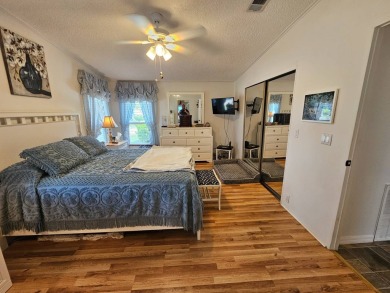 This lovely home is located in North Fort Myers Florida! Pine on Pine Lakes Country Club in Florida - for sale on GolfHomes.com, golf home, golf lot