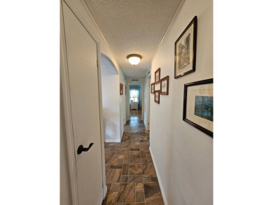 This lovely home is located in North Fort Myers Florida! Pine on Pine Lakes Country Club in Florida - for sale on GolfHomes.com, golf home, golf lot