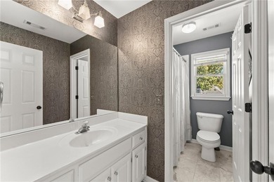 Beautifully situated on a private golf course lot, this stunning on Trophy Club of Apalachee in Georgia - for sale on GolfHomes.com, golf home, golf lot