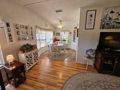 This lovely home is located in North Fort Myers Florida! Pine on Pine Lakes Country Club in Florida - for sale on GolfHomes.com, golf home, golf lot