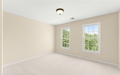 Beautifully situated on a private golf course lot, this stunning on Trophy Club of Apalachee in Georgia - for sale on GolfHomes.com, golf home, golf lot