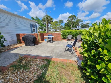 This lovely home is located in North Fort Myers Florida! Pine on Pine Lakes Country Club in Florida - for sale on GolfHomes.com, golf home, golf lot