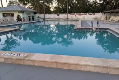 This lovely home is located in North Fort Myers Florida! Pine on Pine Lakes Country Club in Florida - for sale on GolfHomes.com, golf home, golf lot