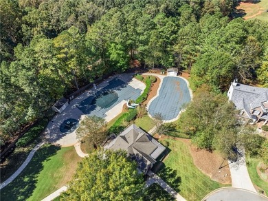 Beautifully situated on a private golf course lot, this stunning on Trophy Club of Apalachee in Georgia - for sale on GolfHomes.com, golf home, golf lot