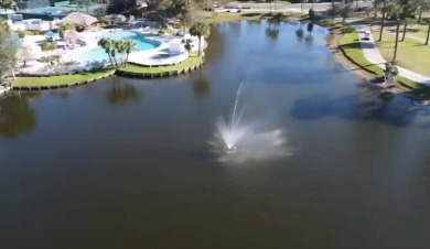 This lovely home is located in North Fort Myers Florida! Pine on Pine Lakes Country Club in Florida - for sale on GolfHomes.com, golf home, golf lot