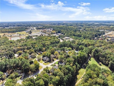 Beautifully situated on a private golf course lot, this stunning on Trophy Club of Apalachee in Georgia - for sale on GolfHomes.com, golf home, golf lot