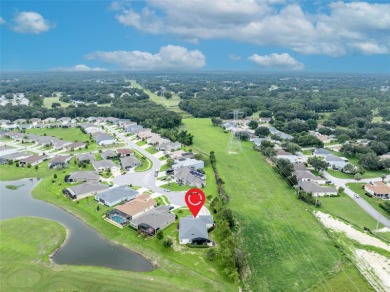Located in the premier 55+ golf community of Arlington Ridge on Arlington Ridge Golf Club in Florida - for sale on GolfHomes.com, golf home, golf lot