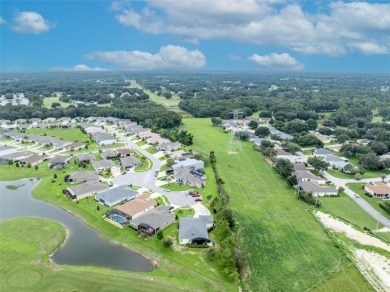 Located in the premier 55+ golf community of Arlington Ridge on Arlington Ridge Golf Club in Florida - for sale on GolfHomes.com, golf home, golf lot