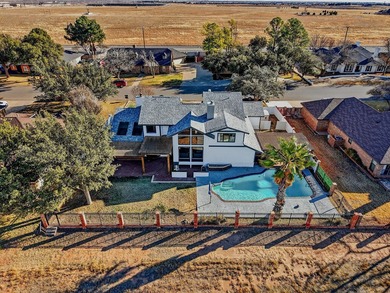 Uniquely contemporary tri-level home offering 5 bedrooms, 4.5 on Green Tree Country Club in Texas - for sale on GolfHomes.com, golf home, golf lot