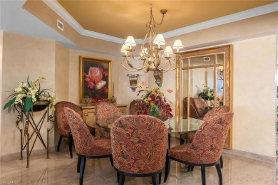 This Tuscany inspired 3-bedroom, 3-bath luxury tower residence on Club at Pelican Bay Golf Course in Florida - for sale on GolfHomes.com, golf home, golf lot