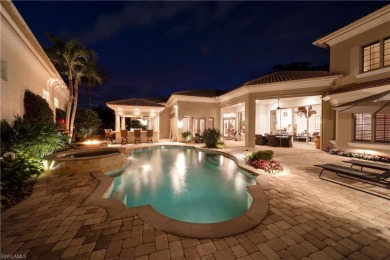 This magnificent two-story courtyard style home features 4BR, 4 on Pelican Marsh Golf Club in Florida - for sale on GolfHomes.com, golf home, golf lot