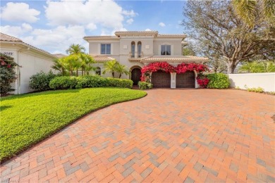 This magnificent two-story courtyard style home features 4BR, 4 on Pelican Marsh Golf Club in Florida - for sale on GolfHomes.com, golf home, golf lot