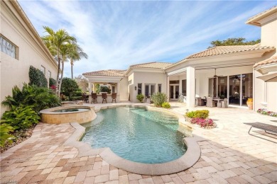 This magnificent two-story courtyard style home features 4BR, 4 on Pelican Marsh Golf Club in Florida - for sale on GolfHomes.com, golf home, golf lot