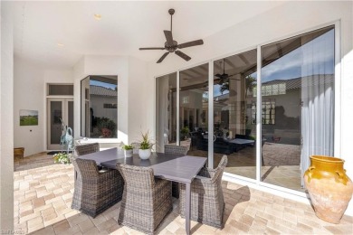 This magnificent two-story courtyard style home features 4BR, 4 on Pelican Marsh Golf Club in Florida - for sale on GolfHomes.com, golf home, golf lot