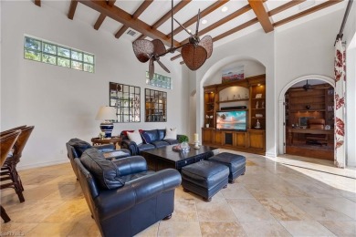 This magnificent two-story courtyard style home features 4BR, 4 on Pelican Marsh Golf Club in Florida - for sale on GolfHomes.com, golf home, golf lot