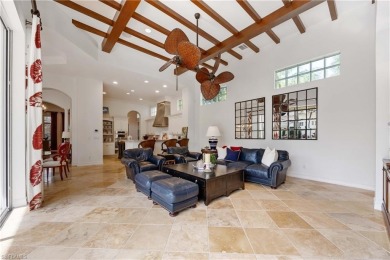 This magnificent two-story courtyard style home features 4BR, 4 on Pelican Marsh Golf Club in Florida - for sale on GolfHomes.com, golf home, golf lot