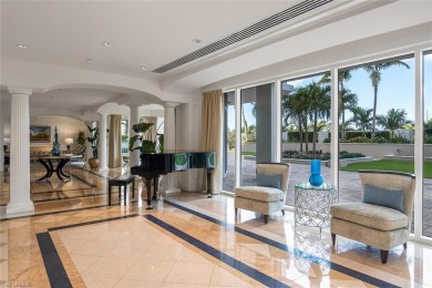 This Tuscany inspired 3-bedroom, 3-bath luxury tower residence on Club at Pelican Bay Golf Course in Florida - for sale on GolfHomes.com, golf home, golf lot