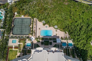 This Tuscany inspired 3-bedroom, 3-bath luxury tower residence on Club at Pelican Bay Golf Course in Florida - for sale on GolfHomes.com, golf home, golf lot