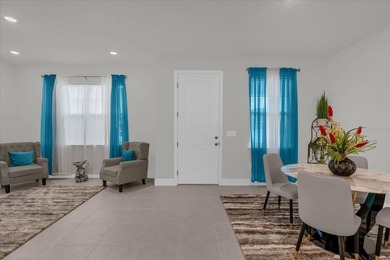 Don't miss your opportunity to own this turn-key townhome that on Harmony Golf Preserve in Florida - for sale on GolfHomes.com, golf home, golf lot