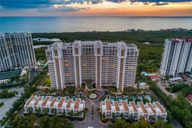 This Tuscany inspired 3-bedroom, 3-bath luxury tower residence on Club at Pelican Bay Golf Course in Florida - for sale on GolfHomes.com, golf home, golf lot