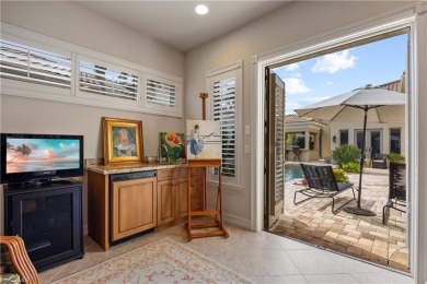 This magnificent two-story courtyard style home features 4BR, 4 on Pelican Marsh Golf Club in Florida - for sale on GolfHomes.com, golf home, golf lot