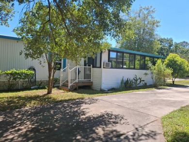 Peaceful 2BR/2BA Home | 1,144 Sq. Ft. | Backs to Ocala Forest - on Rolling Greens Executive Golf Community in Florida - for sale on GolfHomes.com, golf home, golf lot