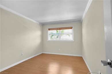 Welcome to easy Florida living at this perfectly located 1/1 on Cypress Lake Country Club in Florida - for sale on GolfHomes.com, golf home, golf lot