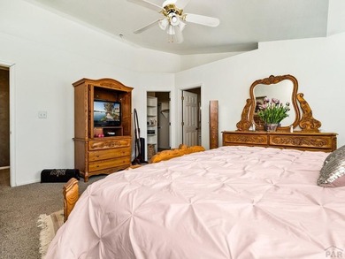 Say YES to this address-beautifully updated and truly move-in on Desert Hawk At Pueblo West in Colorado - for sale on GolfHomes.com, golf home, golf lot