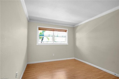 Welcome to easy Florida living at this perfectly located 1/1 on Cypress Lake Country Club in Florida - for sale on GolfHomes.com, golf home, golf lot