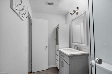 Welcome to easy Florida living at this perfectly located 1/1 on Cypress Lake Country Club in Florida - for sale on GolfHomes.com, golf home, golf lot