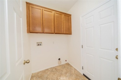 This cute single-story home in  the Tournament Hills community on Morongo Golf Club at Tukwet Canyon in California - for sale on GolfHomes.com, golf home, golf lot
