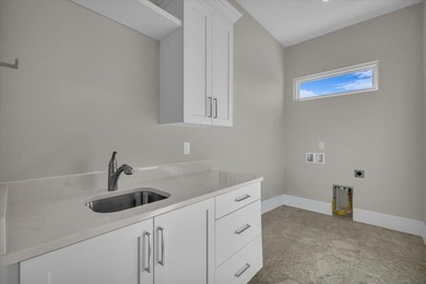 Brand new luxury home in Sandhollow with sweeping golf course on Sand Hollow Golf Resort in Utah - for sale on GolfHomes.com, golf home, golf lot