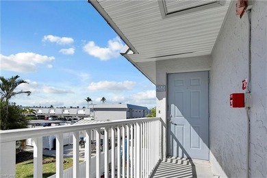 Welcome to easy Florida living at this perfectly located 1/1 on Cypress Lake Country Club in Florida - for sale on GolfHomes.com, golf home, golf lot