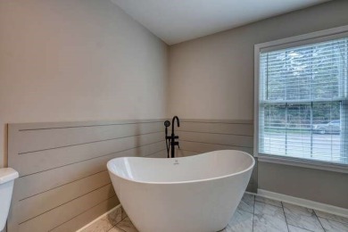 Welcome to this beautifully renovated townhome offering a on  in Georgia - for sale on GolfHomes.com, golf home, golf lot
