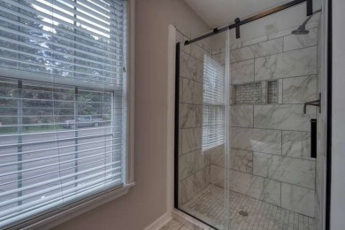 Welcome to this beautifully renovated townhome offering a on  in Georgia - for sale on GolfHomes.com, golf home, golf lot
