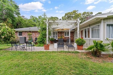 Stylishly updated ranch in Sea Palms. Mexican tile flooring on Sea Palms Golf and Tennis Resort in Georgia - for sale on GolfHomes.com, golf home, golf lot