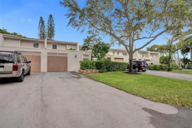 Remarkable + renovated townhouse condo nestled in the heart of on Palm-Aire Country Club and Resort - Palms in Florida - for sale on GolfHomes.com, golf home, golf lot