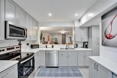 Remarkable + renovated townhouse condo nestled in the heart of on Palm-Aire Country Club and Resort - Palms in Florida - for sale on GolfHomes.com, golf home, golf lot