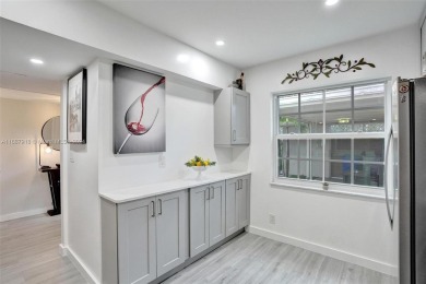 Remarkable + renovated townhouse condo nestled in the heart of on Palm-Aire Country Club and Resort - Palms in Florida - for sale on GolfHomes.com, golf home, golf lot