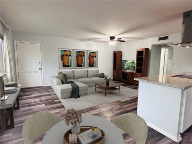 Bright and spacious corner unit in the desirable Century Village on Flamingo Lakes Country Club in Florida - for sale on GolfHomes.com, golf home, golf lot