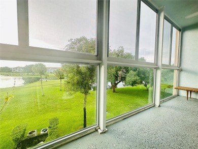 Bright and spacious corner unit in the desirable Century Village on Flamingo Lakes Country Club in Florida - for sale on GolfHomes.com, golf home, golf lot