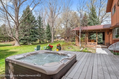 A beautiful corner lot location on a stream in the one-of-a-kind on Ranch at Roaring Fork Golf Course in Colorado - for sale on GolfHomes.com, golf home, golf lot