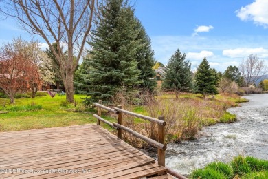 A beautiful corner lot location on a stream in the one-of-a-kind on Ranch at Roaring Fork Golf Course in Colorado - for sale on GolfHomes.com, golf home, golf lot