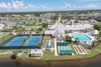 LIVE LIKE YOU'RE ON VACATION IN THE GATED COMMUNITY OF KINGS on Kings Gate Golf Club in Florida - for sale on GolfHomes.com, golf home, golf lot