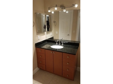 Excellent investment or end-user opportunity! Spacious 2-bedroom on The Carolina Club in Florida - for sale on GolfHomes.com, golf home, golf lot