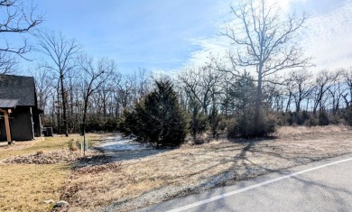 Large Flat Lot for building in the awesome Gated Golf Community on Ledgestone Country Club and Golf Course in Missouri - for sale on GolfHomes.com, golf home, golf lot